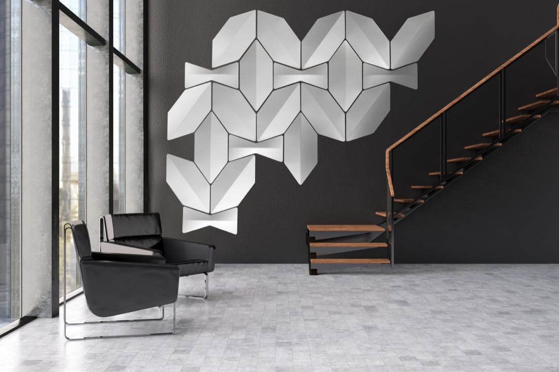 Snowsound Bow sculptural panels clustered on a lobby wall
