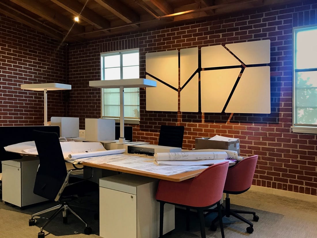 Snowsound Flat panels with LED inlays on an office wall