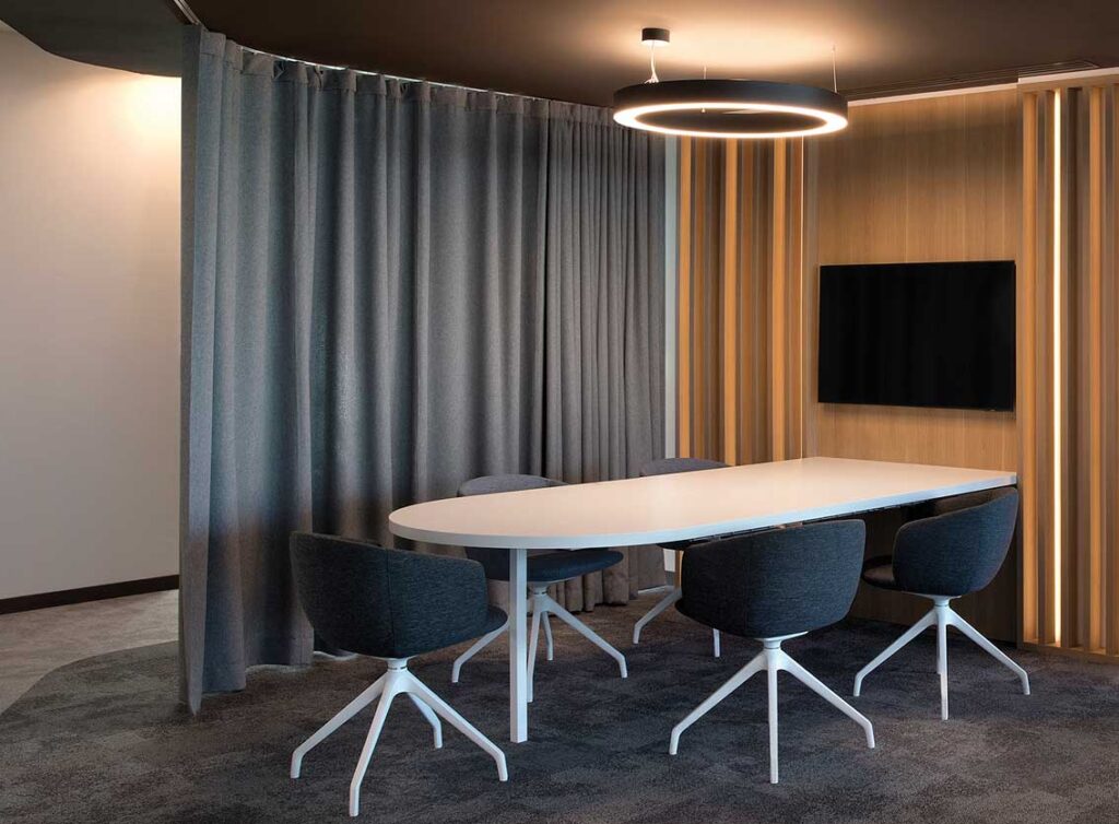 Acoustic curtains and panels softening a residential room
