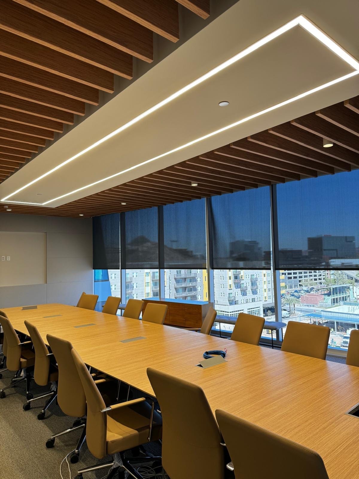 Boardroom with a wood-slat acoustic ceiling